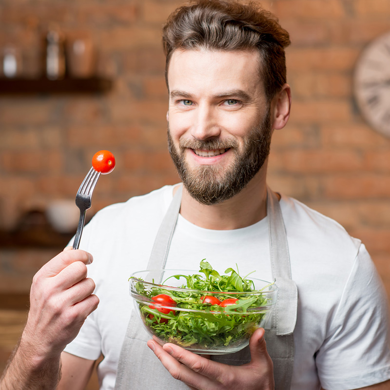 Man eating salad