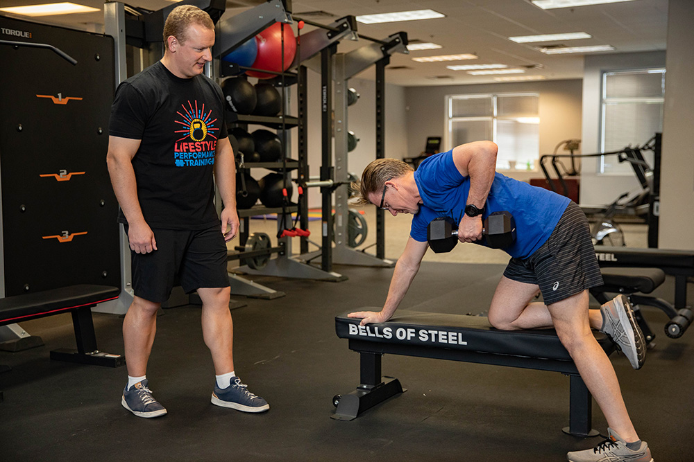 working-out-with-personal-trainer